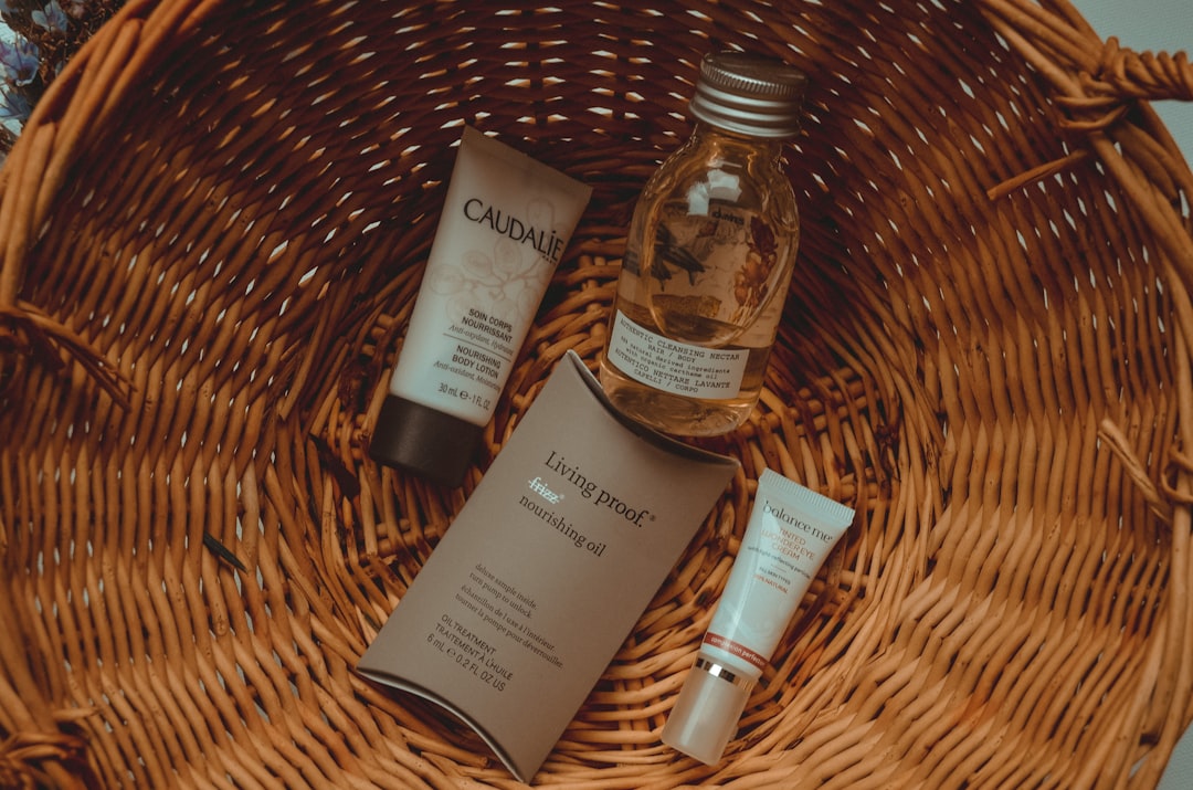 Simple Skincare Routine on a tidy bathroom counter with cleanser, moisturizer, sunscreen, and a folded towel